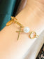 Andi Cross Charm Bracelet